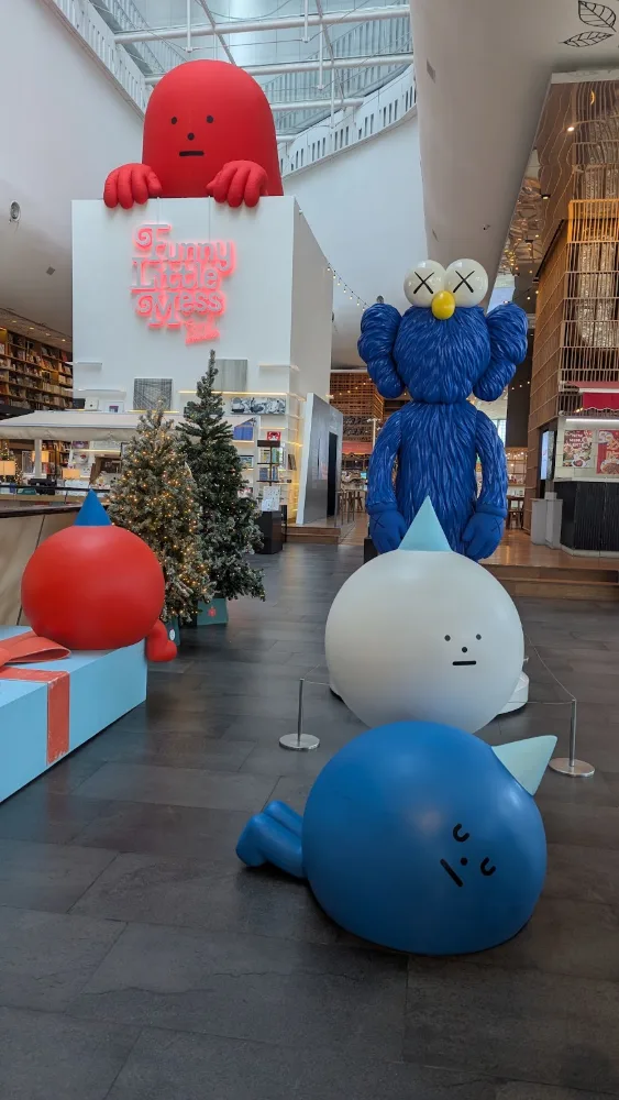 Playful cartoon-character art toys in a Funny Little Mess pop-up installation at a Bangkok mall