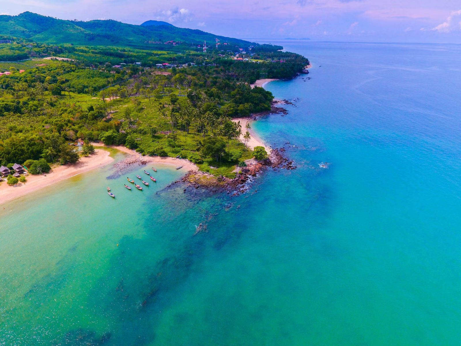 Koh Lanta’s long, quiet west-coast beach and green headland
