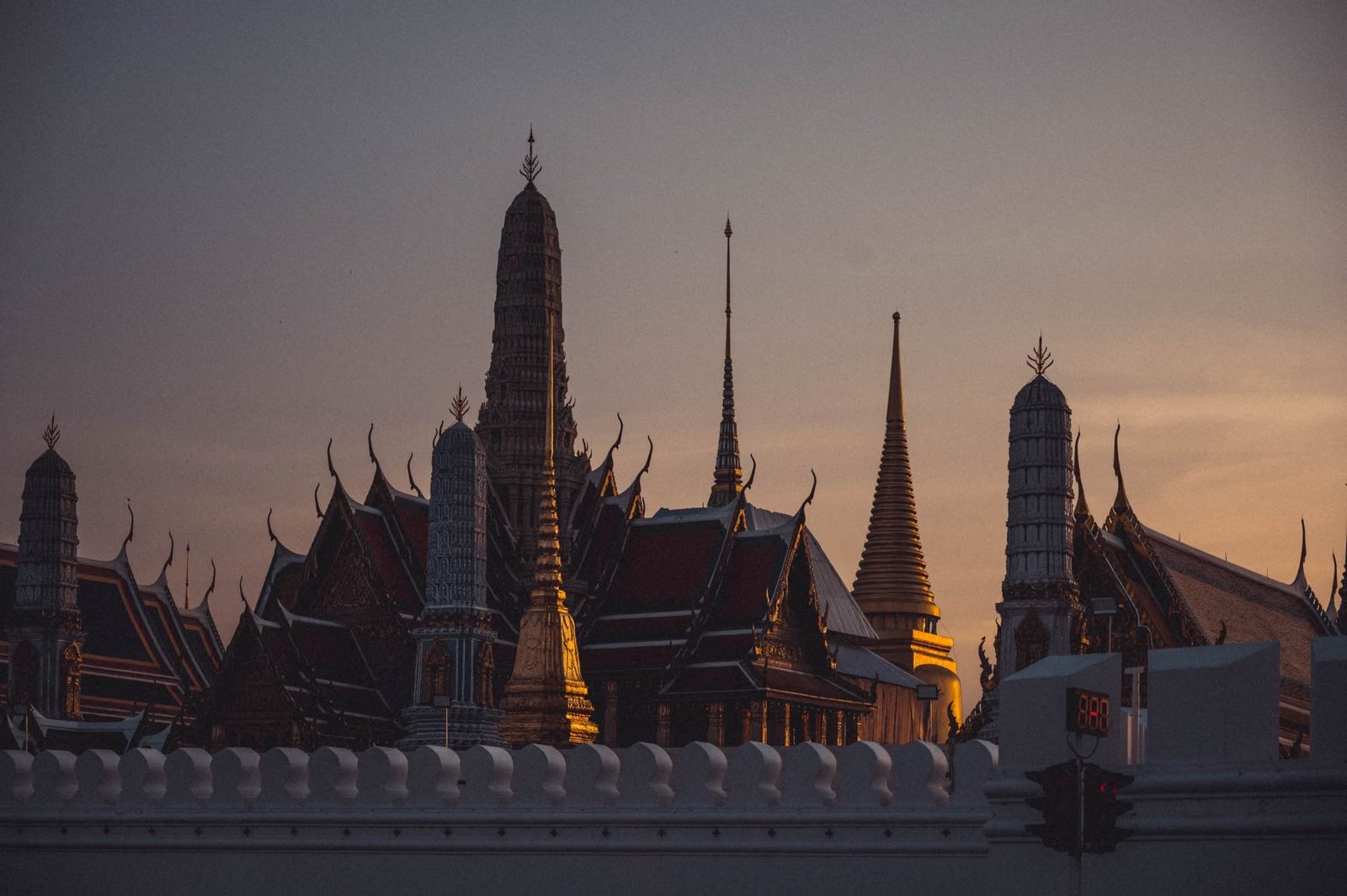 The spires of the Grand Palace and Wat Phra Kaew in Bangkok at dusk