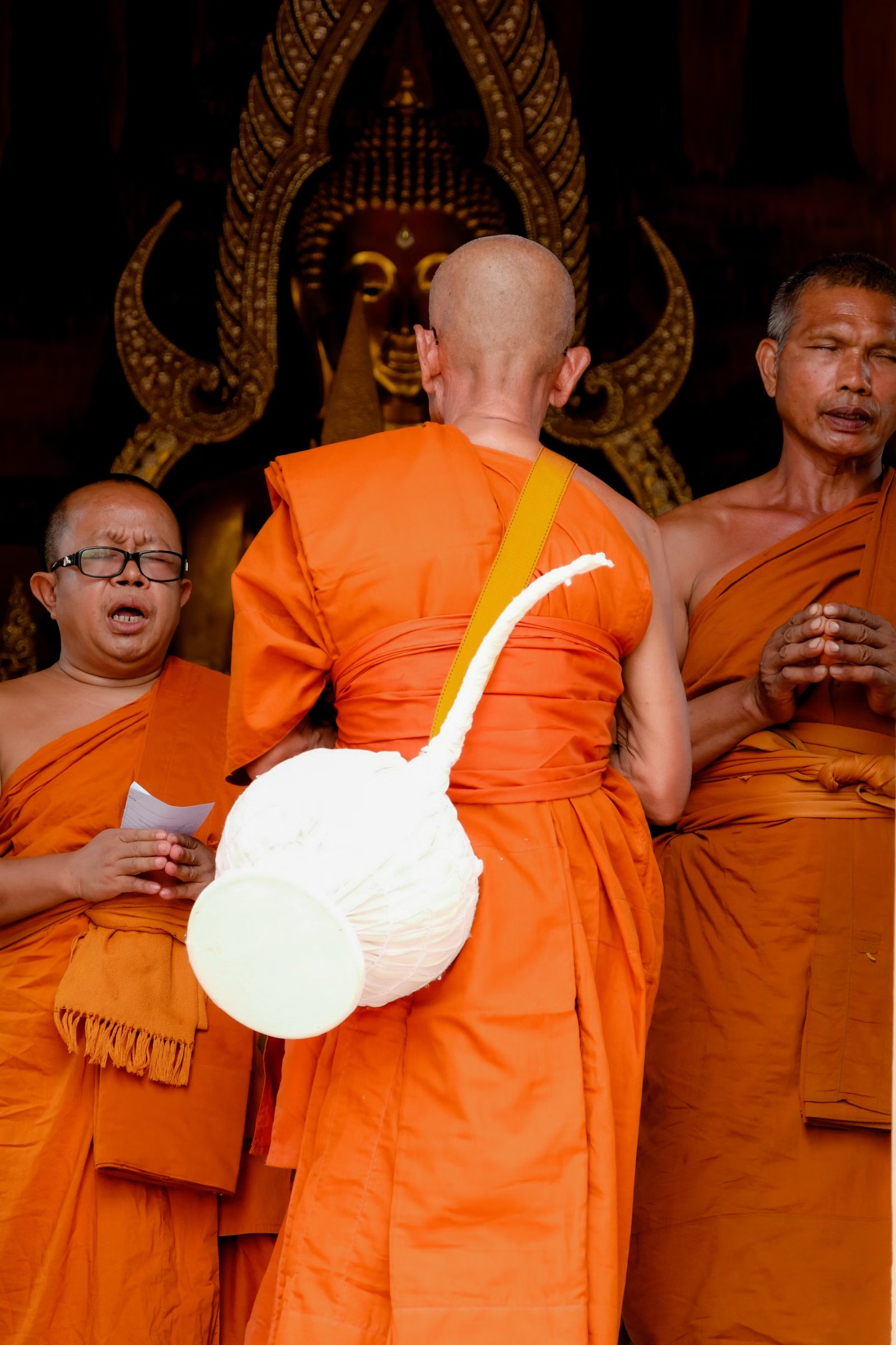 A young monk in a Thai temple