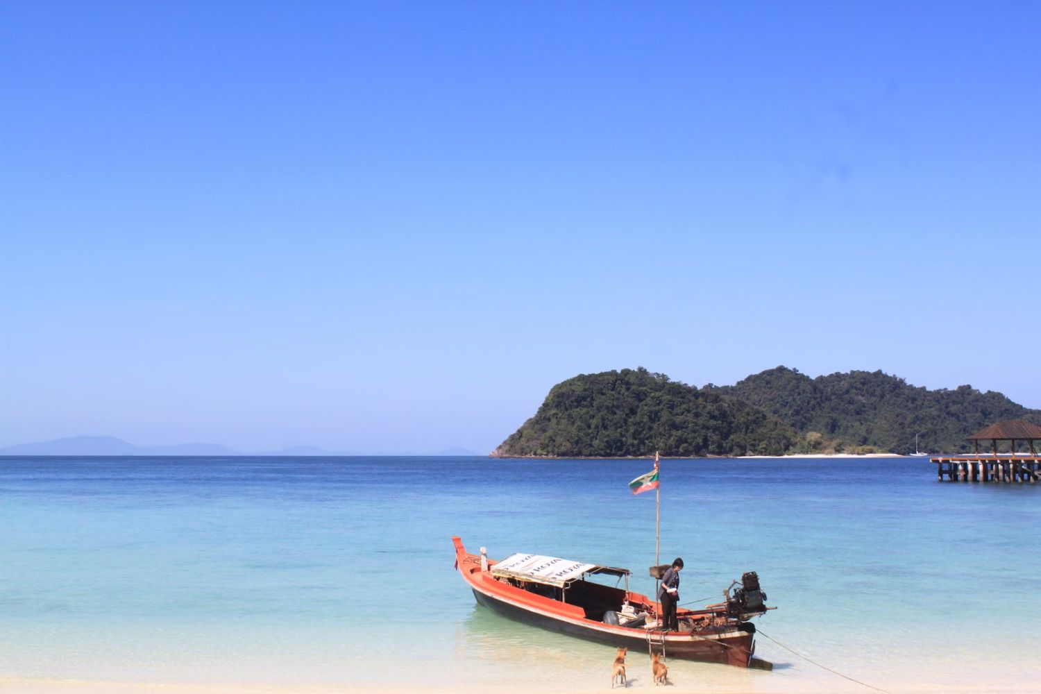 Longtail boat on a Railay beach, Krabi
