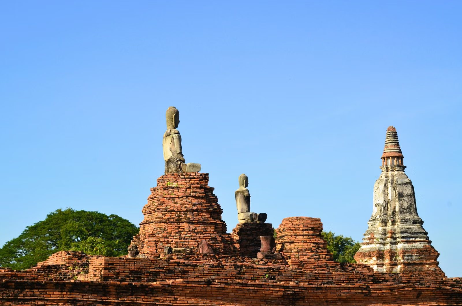 Row of ancient brick stupas in Ayutthaya Historical Park
