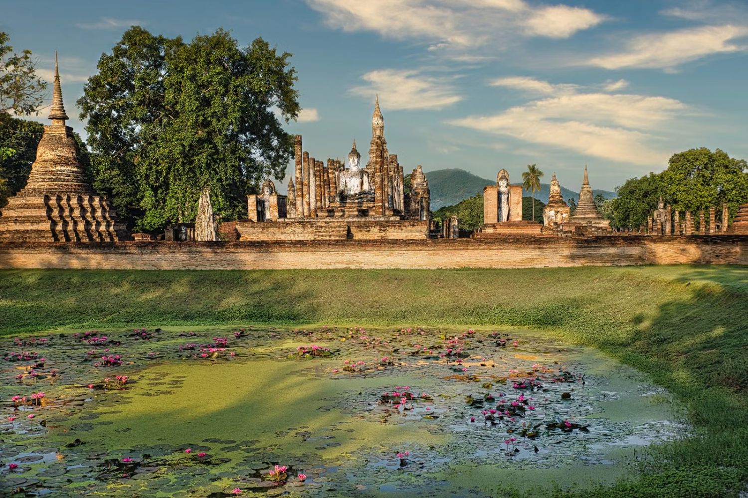 Temple ruins reflected in a pond at Ayutthaya