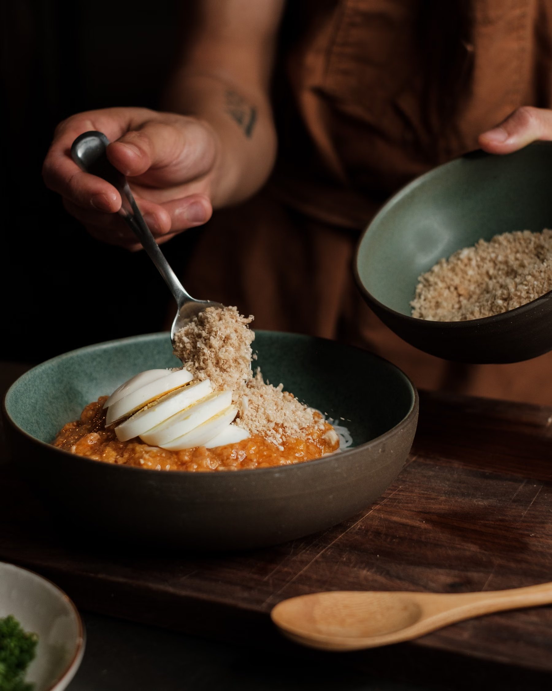 An elegant fine-dining plate at a chef’s pass