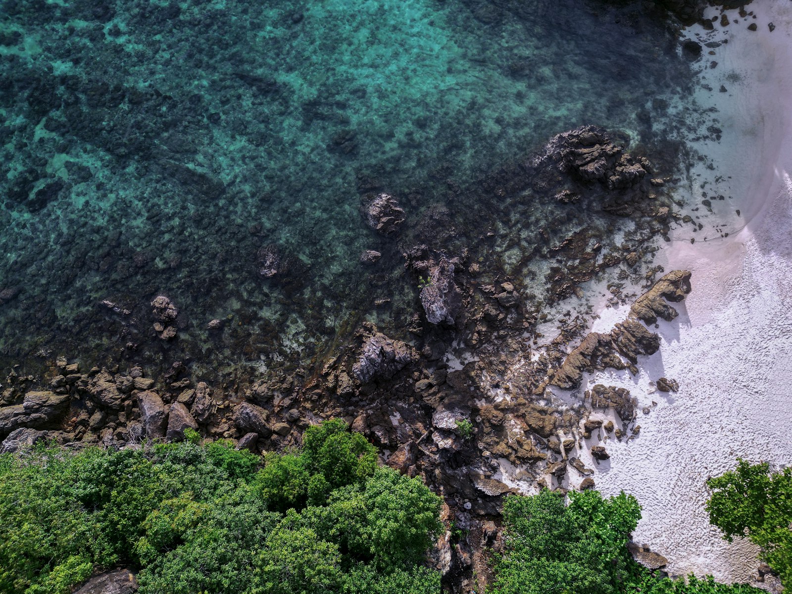 Aerial view of a Phuket beach and turquoise water