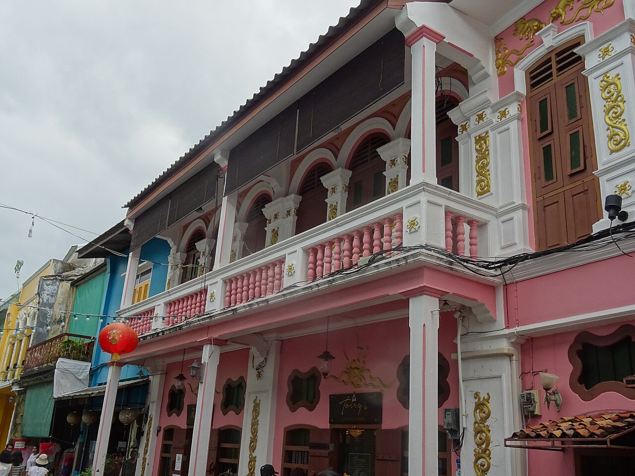 Sino-Portuguese shophouse row in Phuket Old Town, painted facades