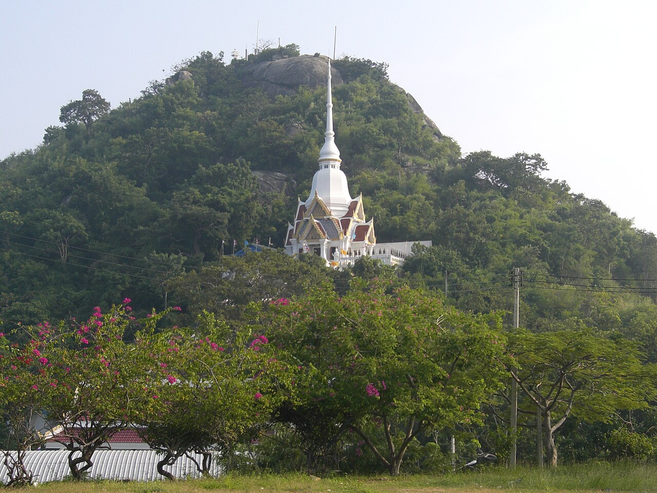 Khao Takiab temple hill and the standing Buddha above the sea