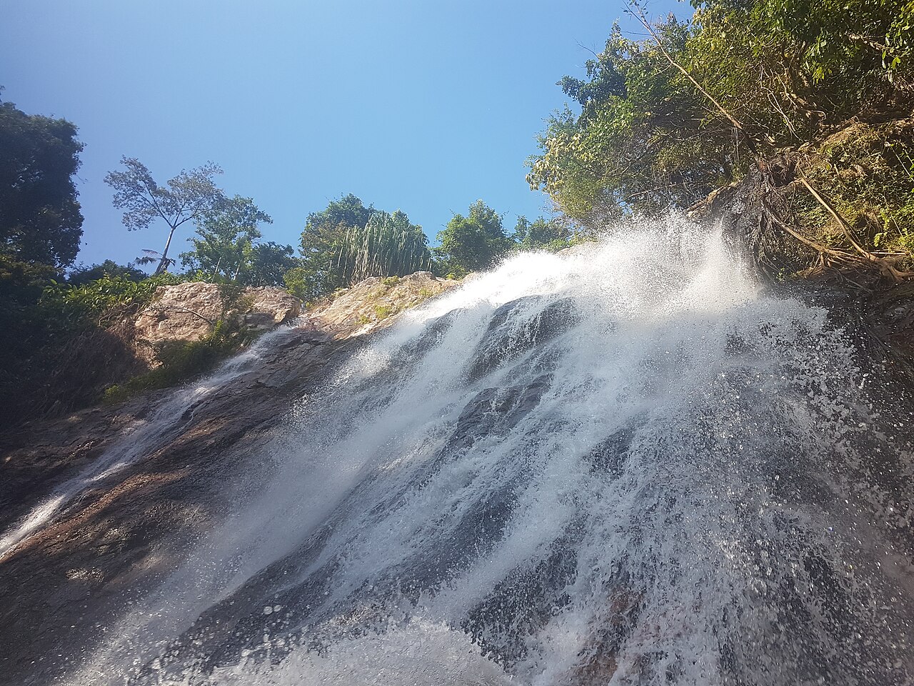 Na Muang waterfall in the island’s green interior