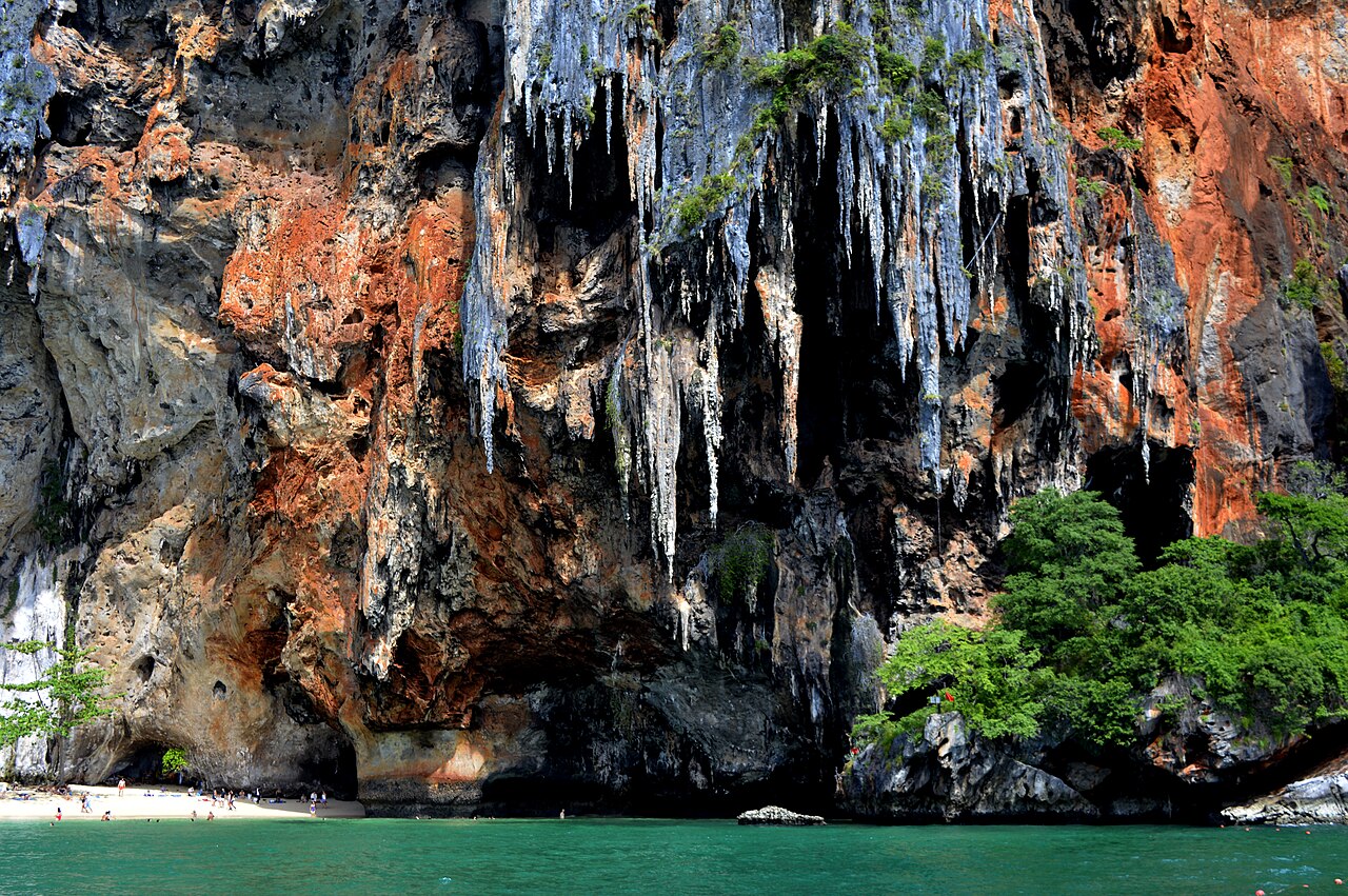 Railay’s limestone wall above the beach at low tide